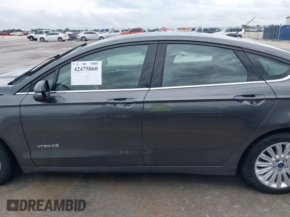 2015 Ford Fusion SE Hybrid with VIN 3FA6P0LU7FR254503, listed as a IAAI auction lot 42475860 with 169,980 mi miles and . Bid and sale history available at DreamBid. Image 15.