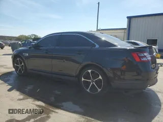 2015 Ford Taurus SEL with VIN 1FAHP2E87FG208522, listed as a Copart auction lot 46700095 with 97,439 mi miles and Salvage title. Bid and sale history available at DreamBid. Image 2.
