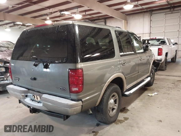 1999 Ford Expedition XLT z VIN 1FMPU18LXXLB47700, wystawiony jako IAAI lot #41592004 z przebiegiem Nie podano mil oraz . Historia ofert i sprzedaży dostępna na DreamBid. Obrazek 4.