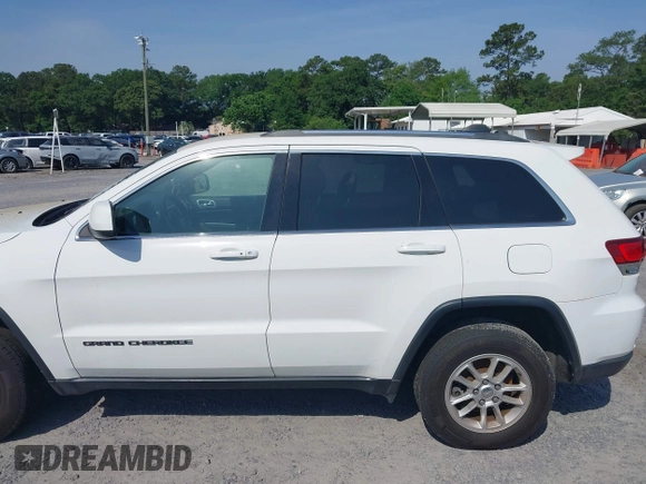 2020 Jeep Grand Cherokee Laredo E with VIN 1C4RJFAG1LC389026, listed as a IAAI auction lot 42261396 with 100,409 mi miles and . Bid and sale history available at DreamBid. Image 14.