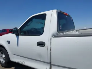 2003 Ford F-150 XL with VIN 2FTRF17W73CA77144, listed as a IAAI auction lot 42609120 with 102,490 mi miles and . Bid and sale history available at DreamBid. Image 14.