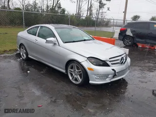2013 Mercedes-Benz C-Class C 250 with VIN WDDGJ4HB3DF971933, listed as a IAAI auction lot 41628220 with 124,583 mi miles. Bid and sale history available at carsss.com. Image 1.