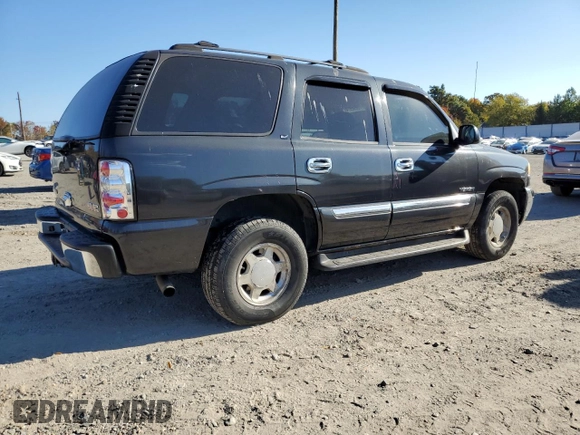 2004 GMC Yukon SLE with VIN 1GKEK13V24J236327, listed as a Copart auction lot 76896974 with 151,028 mi miles and Salvage Title. Bid and sale history available at carsss.com. Image 3.
