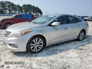2013 Hyundai Azera z VIN KMHFG4JG9DA252768, wystawiony jako Copart lot #59143035 z przebiegiem 118 260 mil mil oraz Czysty tytuł • Clean title. Historia ofert i sprzedaży dostępna na DreamBid. Obrazek 1.