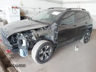 2016 Jeep Cherokee Trailhawk with VIN 1C4PJMBS0GW169184, listed as a IAAI auction lot 42255346 with 152,802 mi miles and . Bid and sale history available at DreamBid. Image 17.