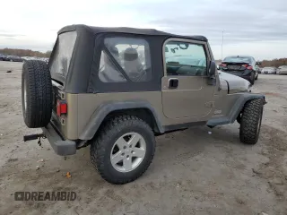 2003 Jeep Wrangler SE with VIN 1J4FA29183P324978, listed as a Copart auction lot 79172464 with Not provided miles and Salvage title. Bid and sale history available at DreamBid. Image 3.