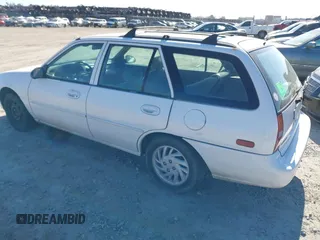 1999 Ford Escort SE with VIN 3FAFP15P4XR162456, listed as a IAAI auction lot 41245885 with 159,128 mi miles. Bid and sale history available at carsss.com. Image 3.