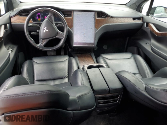 2018 Tesla Model X 75D with VIN 5YJXCBE24JF130216, listed as a Copart auction lot 48894215 with 75,694 mi miles and Salvage Title. Bid and sale history available at carsss.com. Image 8.