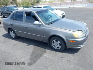 2003 Hyundai Accent GL with VIN KMHCG45C73U471607, listed as a IAAI auction lot 41956551 with 222,305 mi miles. Bid and sale history available at carsss.com. Image 1.