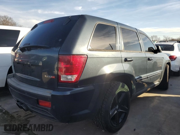 2008 Jeep Grand Cherokee SRT-8 with VIN 1J8HR78348C174334, listed as a Copart auction lot 86631744 with 0 mi miles and Salvage Title. Bid and sale history available at carsss.com. Image 3.