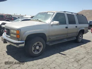 1999 GMC Suburban with VIN 1GDGK26J6XJ777755, listed as a Copart auction lot 61842385 with 88,324 mi miles and Clean title. Bid and sale history available at DreamBid. Image 1.