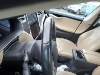 2014 Tesla Model S 60 with VIN 5YJSA1H18EFP45810, listed as a Copart auction lot 86313244 with Not Provided miles and Salvage Title. Bid and sale history available at DreamBid. Image 9.