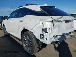 2024 Lexus RX with VIN JTJCHMAA6R2013967, listed as a IAAI auction lot 41677809 with 16,563 mi miles. Bid and sale history available at carsss.com. Image 3.