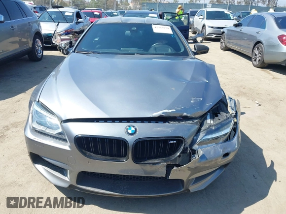 2013 BMW M6 with VIN WBSLX9C51DC968593, listed as a IAAI auction lot 42465979 with 88,010 mi miles and . Bid and sale history available at DreamBid. Image 12.