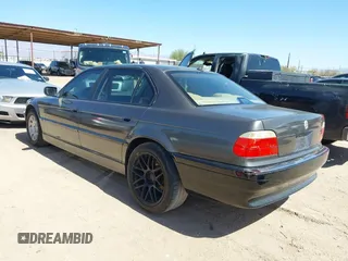 2001 BMW 7 Series 740iL with VIN WBAGH83421DP25417, listed as a IAAI auction lot 41725971 with 165,599 mi miles. Bid and sale history available at carsss.com. Image 3.