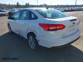 2016 Ford Focus SE with VIN 1FADP3FE4GL208981, listed as a IAAI auction lot 41699896 with 155,387 mi miles. Bid and sale history available at carsss.com. Image 3.
