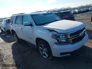 2020 Chevrolet Tahoe LT with VIN 1GNSKBKC1LR290889, listed as a IAAI auction lot 41492821 with 107,843 mi miles. Bid and sale history available at carsss.com. Image 1.