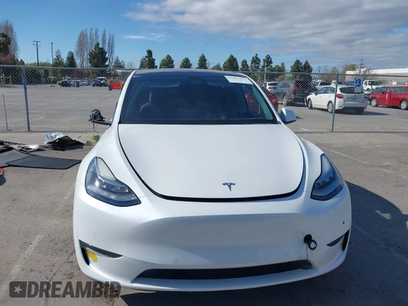 2022 Tesla Model Y Long Range with VIN 7SAYGDEE0NF340822, listed as a IAAI auction lot 41881224 with Not Provided miles and . Bid and sale history available at DreamBid. Image 13.