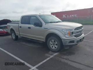 2018 Ford F-150 XL z VIN 1FTFW1EG2JKE19350, wystawiony jako IAAI lot #42638640 z przebiegiem 145 595 mil mil oraz . Historia ofert i sprzedaży dostępna na DreamBid. Obrazek 1.