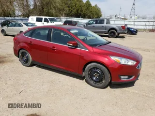 2016 Ford Focus Titanium z VIN 1FADP3J24GL272970, wystawiony jako Copart lot #54539215 z przebiegiem 60 007 mil mil oraz Czysty tytuł • Clean title. Historia ofert i sprzedaży dostępna na DreamBid. Obrazek 4.