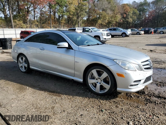 2012 Mercedes-Benz E 550 with VIN WDDKJ7DB2CF151973, listed as a Copart auction lot 82667474 with 130,590 mi miles and Salvage Title. Bid and sale history available at DreamBid. Image 4.
