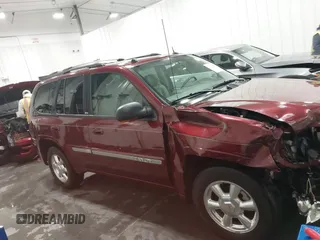 2005 GMC Envoy SLT with VIN 1GKDT13S752214687, listed as a IAAI auction lot 41421248 with 145,388 mi miles. Bid and sale history available at carsss.com. Image 14.