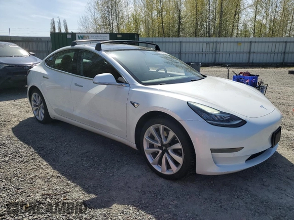 2019 Tesla Model 3 Mid Range with VIN 5YJ3E1EA0KF484178, listed as a Copart auction lot 53121915 with 64,929 mi miles and Salvage Title. Bid and sale history available at DreamBid. Image 4.