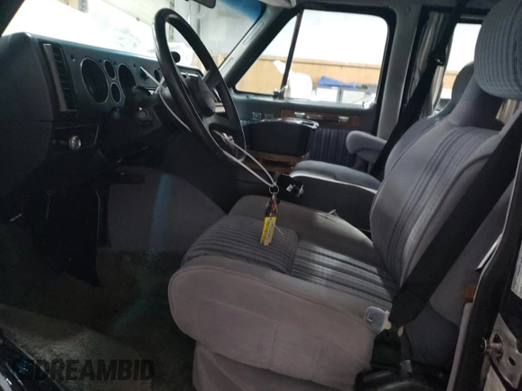 1988 Chevrolet Chevy Van z VIN 2GBEG25K2J4137750, wystawiony jako Copart lot #89310475 z przebiegiem 26 823 mil mil oraz Szkoda całkowita • Salvage title. Historia ofert i sprzedaży dostępna na DreamBid. Obrazek 7.