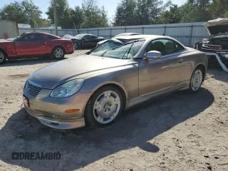 2002 Lexus SC 430 with VIN JTHFN48Y220006106, listed as a Copart auction lot 76703744 with 114,122 mi miles and Salvage Title. Bid and sale history available at DreamBid. Image 1.
