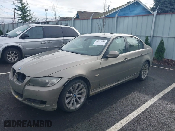 2011 BMW 3 Series 328i with VIN WBAPH5C57BA443932, listed as a IAAI auction lot 40832127 with 206,426 mi miles and . Bid and sale history available at carsss.com. Image 2.