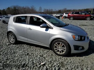 2013 Chevrolet Sonic LT with VIN 1G1JC6SH2D4210219, listed as a Copart auction lot 45314495 with 127,217 mi miles and Salvage Title. Bid and sale history available at carsss.com. Image 4.