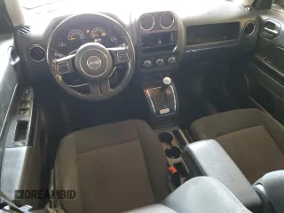 2014 Jeep Patriot Latitude with VIN 1C4NJPFB0ED890696, listed as a Copart auction lot 55581825 with 70,030 mi miles and Salvage title. Bid and sale history available at DreamBid. Image 8.