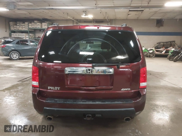 2011 Honda Pilot EX-L with VIN 5FNYF4H56BB051404, listed as a IAAI auction lot 41758332 with 301,099 mi miles. Bid and sale history available at carsss.com. Image 17.