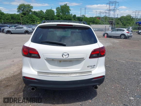 2014 Mazda CX-9 Grand Touring z VIN JM3TB3DV0E0436649, wystawiony jako IAAI lot #42319638 z przebiegiem 128 421 mil mil oraz . Historia ofert i sprzedaży dostępna na DreamBid. Obrazek 16.