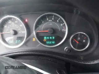 2013 Jeep Wrangler Sport z VIN 1C4AJWAG9DL653348, wystawiony jako IAAI lot #42096860 z przebiegiem 55 575 mil mil oraz . Historia ofert i sprzedaży dostępna na DreamBid. Obrazek 7.