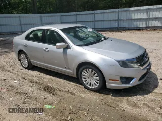 2010 Ford Fusion Hybrid с VIN 3FADP0L33AR171285, выставлен на аукционе Copart как лот 64983995 с пробегом 166 596 миль миль и Чистый • Clean title. История ставок и продаж доступна на DreamBid. Изображение 4.