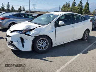 2022 Toyota Prius L Eco z VIN JTDKAMFU6N3177732, wystawiony jako Copart lot #52620175 z przebiegiem 65 337 mil mil oraz Szkoda całkowita • Salvage title. Historia ofert i sprzedaży dostępna na DreamBid. Obrazek 1.