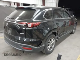 2018 Mazda CX-9 Touring with VIN JM3TCACY9J0213310, listed as a IAAI auction lot 42047663 with 78,409 mi miles and . Bid and sale history available at carsss.com. Image 4.