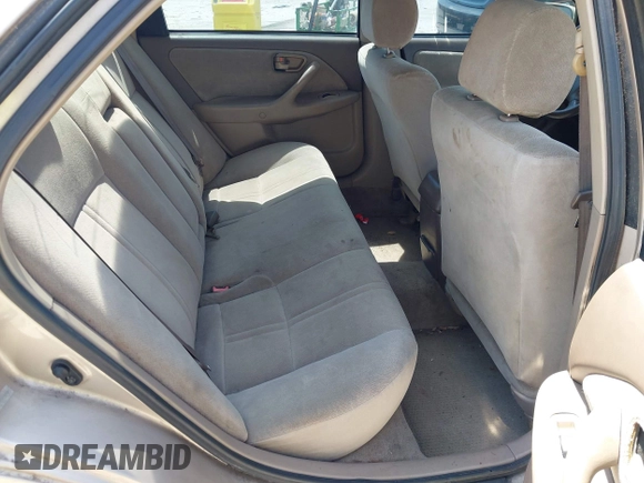 2000 Toyota Camry CE z VIN 4T1BG22K5YU972322, wystawiony jako IAAI lot #42098429 z przebiegiem 122 351 mil mil oraz . Historia ofert i sprzedaży dostępna na DreamBid. Obrazek 8.