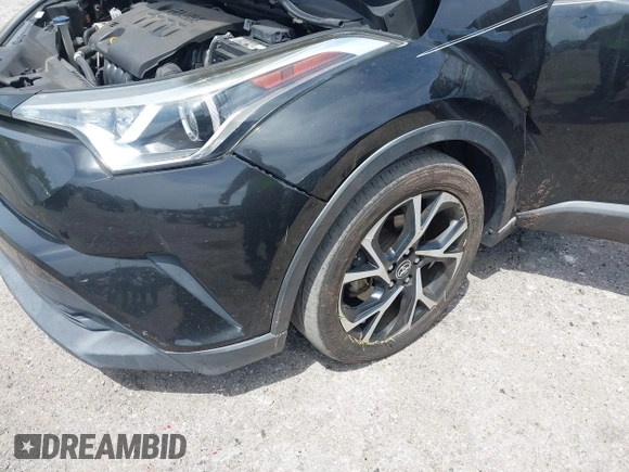 2018 Toyota C-HR XLE with VIN NMTKHMBX0JR008423, listed as a IAAI auction lot 42091445 with 124,811 mi miles. Bid and sale history available at carsss.com. Image 6.
