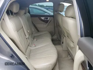 2014 Infiniti QX70 with VIN JN8CS1MW7EM412867, listed as a Copart auction lot 60054195 with 148,064 mi miles and Salvage title. Bid and sale history available at DreamBid. Image 11.