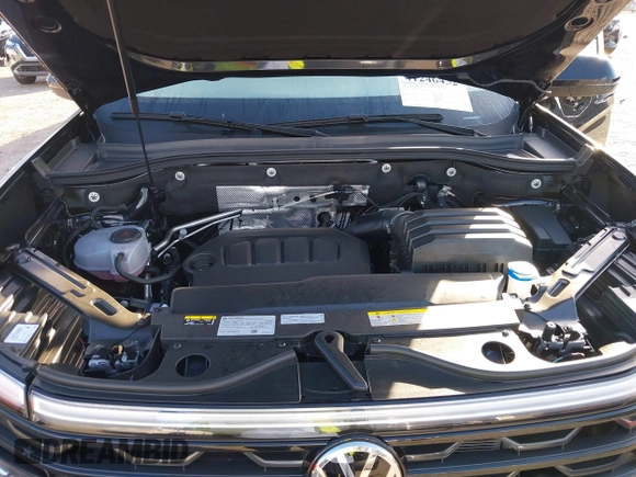2025 Volkswagen Atlas SE z VIN 1V2JE2CA7SC201481, wystawiony jako IAAI lot #41246452 z przebiegiem 2 466 mil mil oraz . Historia ofert i sprzedaży dostępna na DreamBid. Obrazek 10.