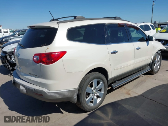 2012 Chevrolet Traverse 1LT with VIN 1GNKRGED4CJ131702, listed as a IAAI auction lot 41725454 with 137,023 mi miles and . Bid and sale history available at DreamBid. Image 4.