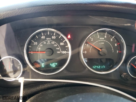 2011 Jeep Wrangler Unlimited Sahara with VIN 1J4BA5H15BL635016, listed as a Copart auction lot 84433444 with 124,217 mi miles and Salvage Title. Bid and sale history available at carsss.com. Image 9.
