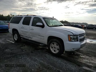 2013 Chevrolet Suburban LT with VIN 1GNSCJE06DR203594, listed as a Copart auction lot 63114724 with 263,456 mi miles and Salvage Title. Bid and sale history available at carsss.com. Image 4.