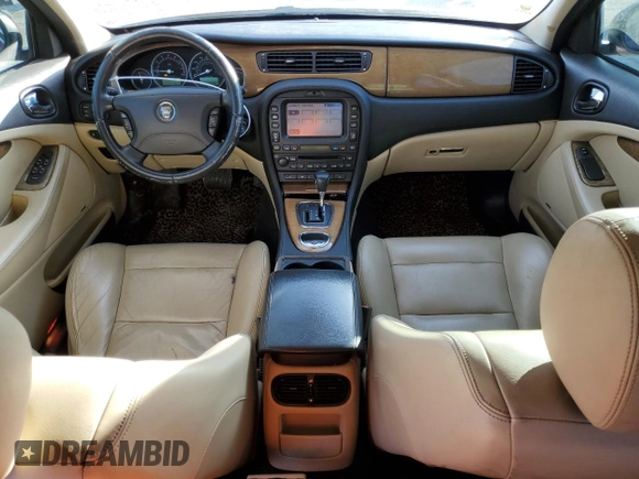 2005 Jaguar S-Type with VIN SAJWA03V451N43191, listed as a Copart auction lot 88491545 with 121,973 mi miles and Salvage Title. Bid and sale history available at DreamBid. Image 8.