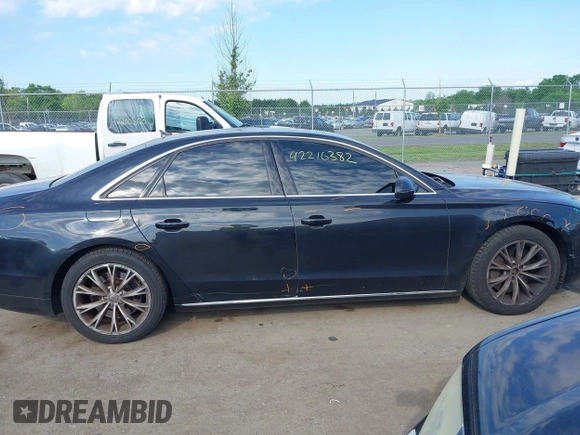 2012 Audi A8 with VIN WAUAVAFD8CN029546, listed as a IAAI auction lot 42216382 with 144,989 mi miles and . Bid and sale history available at DreamBid. Image 13.