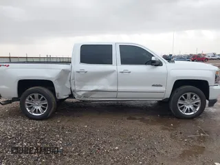 2018 Chevrolet Silverado 1500 High Country with VIN 3GCUKTEC1JG331991, listed as a IAAI auction lot 41718084 with 120,924 mi miles and . Bid and sale history available at DreamBid. Image 13.