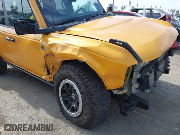 2022 Ford Bronco with VIN 1FMEE5DH6NLB14350, listed as a IAAI auction lot 41486823 with 27,587 mi miles and . Bid and sale history available at DreamBid. Image 6.