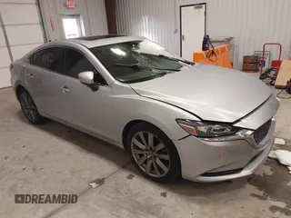 2018 Mazda 6 Touring with VIN JM1GL1VM8J1312778, listed as a IAAI auction lot 41387098 with 129,611 mi miles and . Bid and sale history available at carsss.com. Image 1.